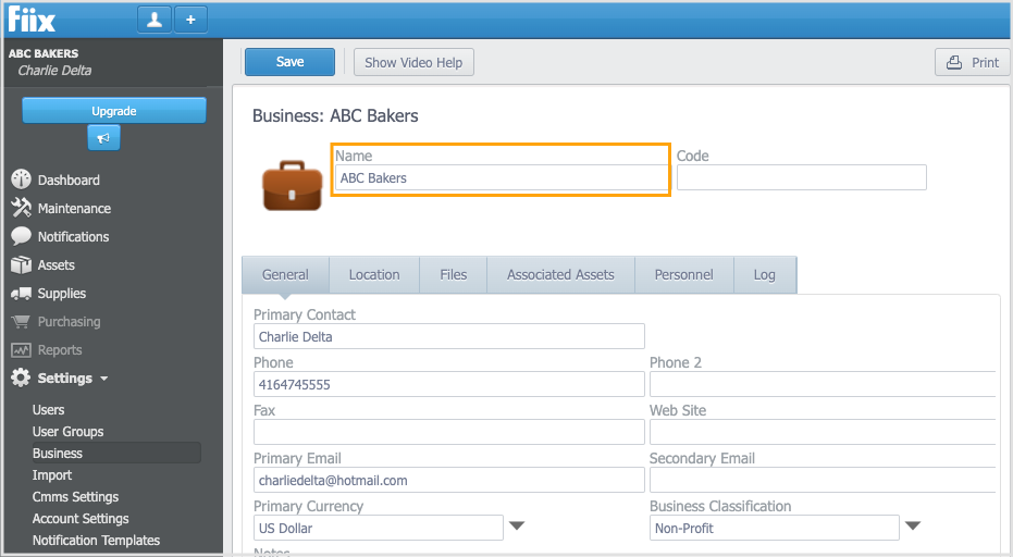 Screenshot of Fiix CMMS with orange callout box highlighting the Name change field